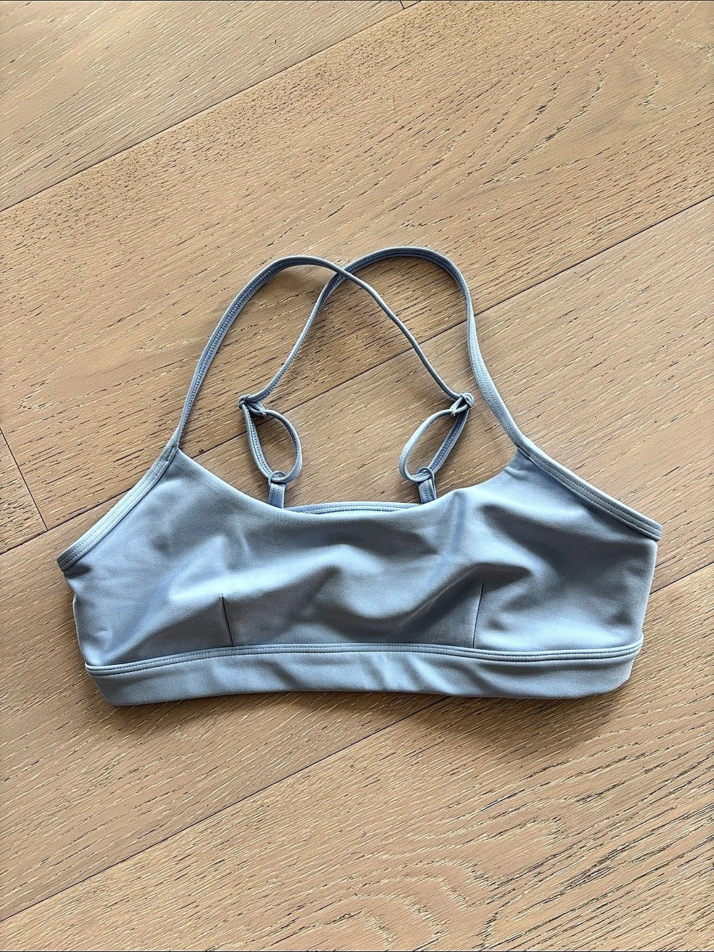 Alo Yoga “Airlift Intrigue Bra” in “Seashell Blue”
